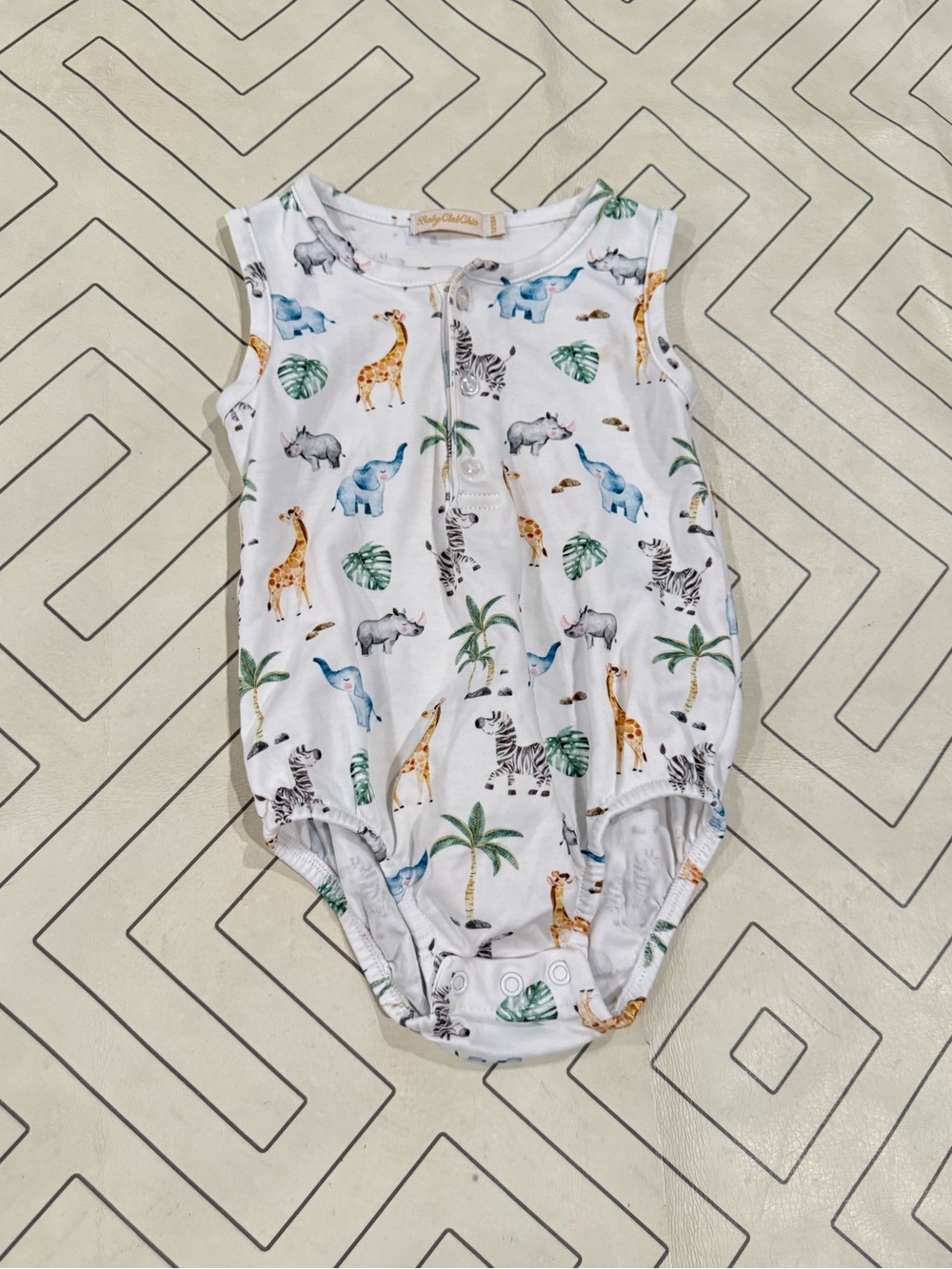 Baby Club Chic Onesie in White with Animal Print